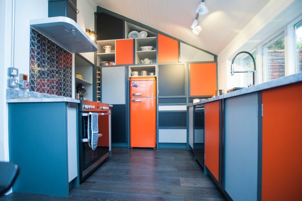 Kitchen interior in blue-orange combination