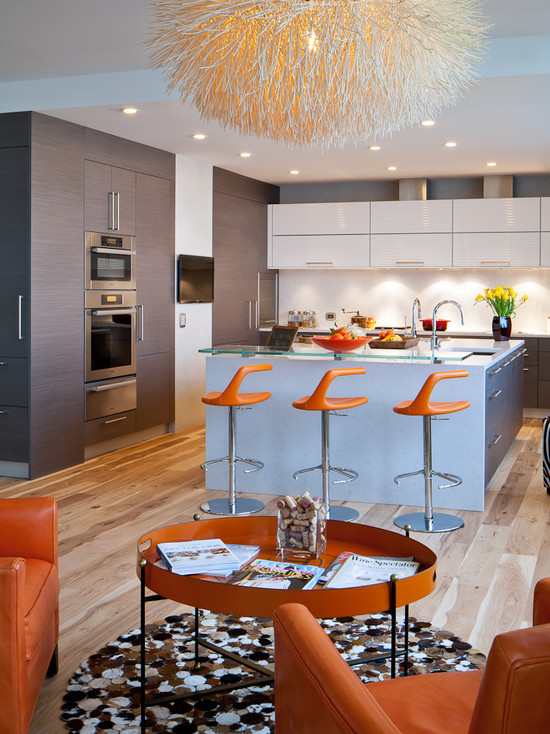 Kitchen in high-tech style with orange furniture