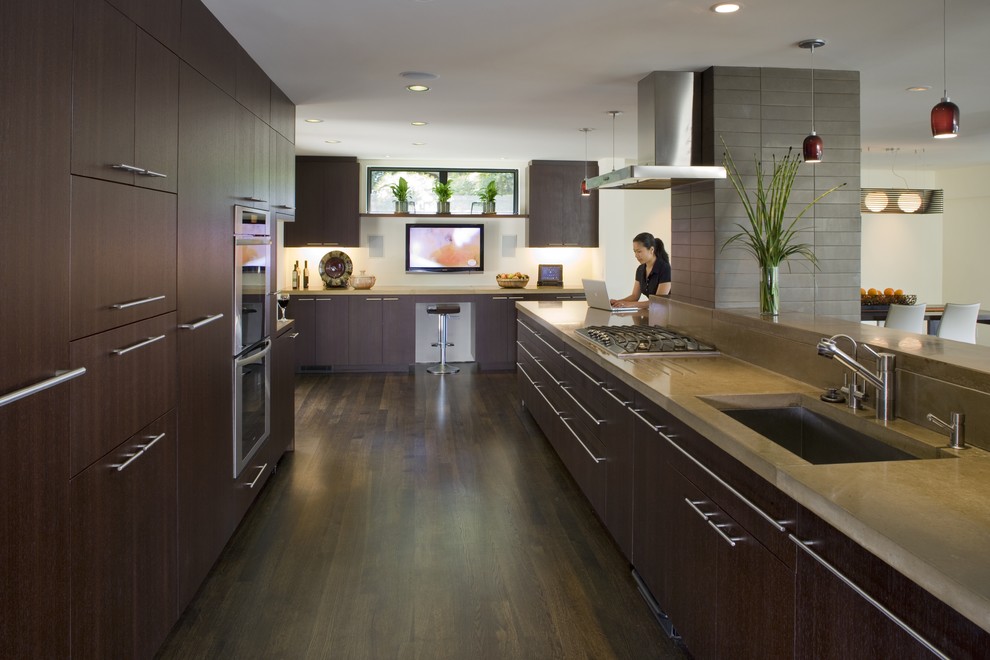 The combination of wood, white and orange in the interior of modern kitchen